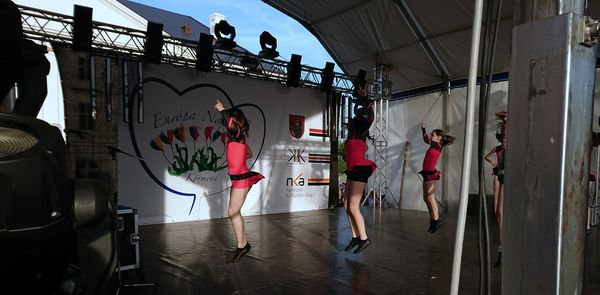 Group of people standing on stage