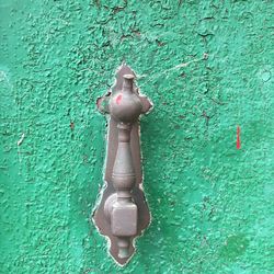 Close-up of metal against water