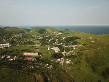 High angle view of trees and buildings against sky