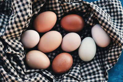 High angle view of eggs in container