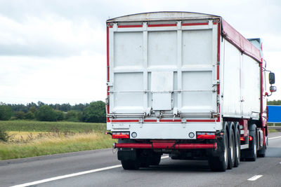 View of truck on road against sky