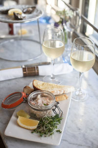 Wine glasses on table with crab