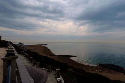 Panoramic view of beach against sky during sunset