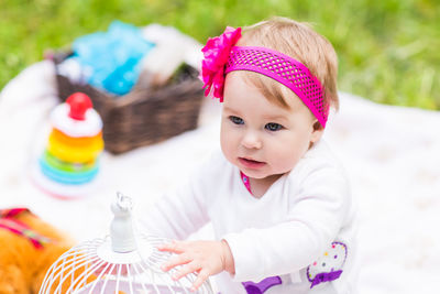 Portrait of cute girl playing