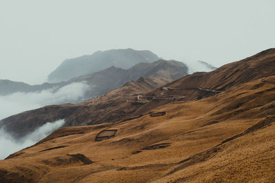 Road through the mountains and clouds