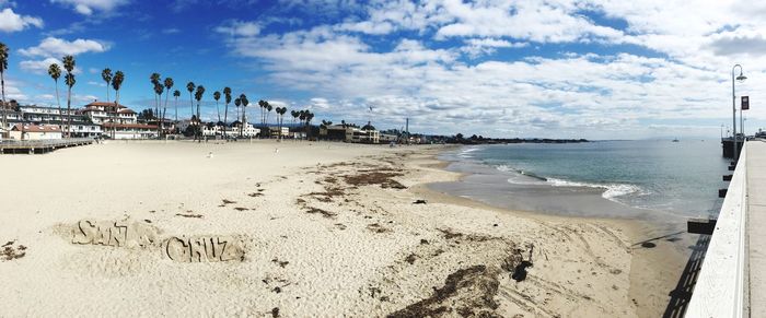 View of calm beach against the sky