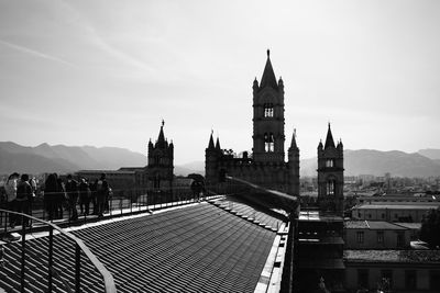 Buildings in city against sky