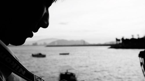 Close-up portrait of silhouette man looking at view