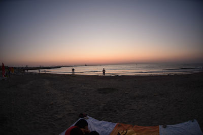 Scenic view of beach during sunset