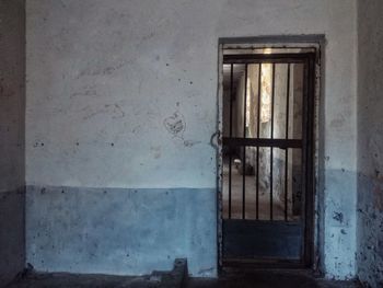 Close-up of window of abandoned building