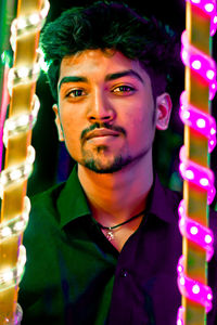 Portrait of young man looking away