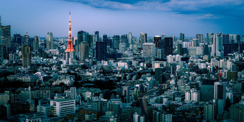 Aerial view of cityscape against sky