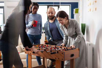 Group of people playing on table