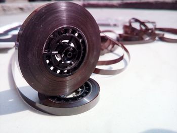 Close-up of reels on table