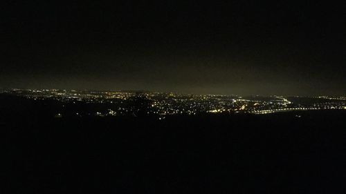 Illuminated cityscape at night