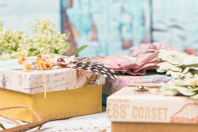 Close-up of decorated gift boxes on table at home