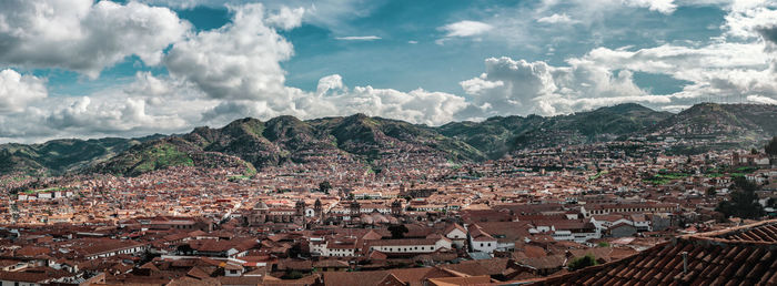 Aerial view of townscape against sky