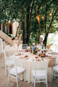 Empty chairs and tables in restaurant