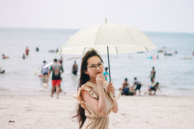 Woman standing at beach