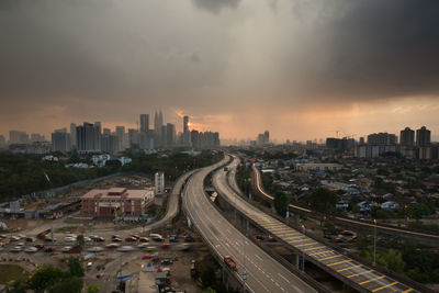 High angle view of cityscape against sky at sunset