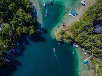Aerial view of boats sailing in river