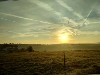 Scenic view of landscape against sky during sunset