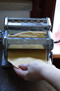 Close-up of person preparing food