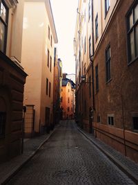 View of city street at sunset