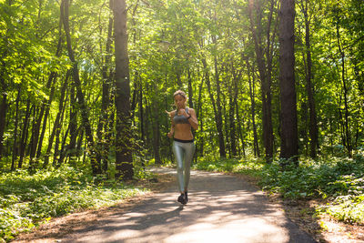 Full length of woman in forest