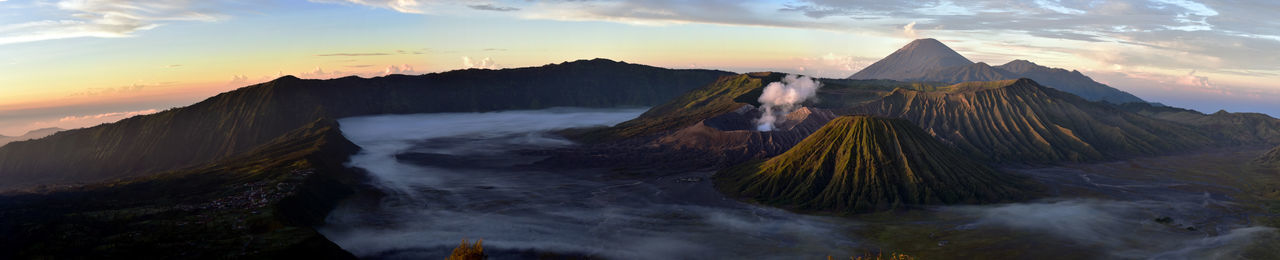 Panoramic view of mountains against sky during sunset