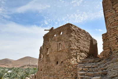 Low angle view of historic building against sky