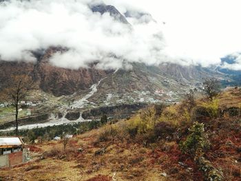 Scenic view of mountains against sky during winter