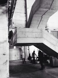 Woman standing against wall