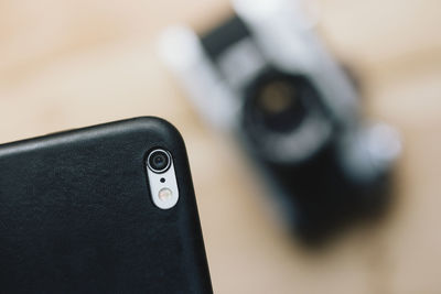 Close-up of smart phone on table