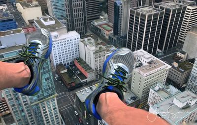 Close-up of man working on bridge