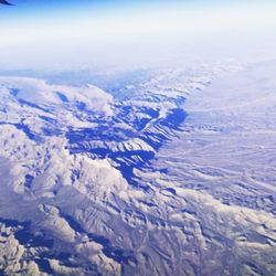 Scenic view of snow covered mountains