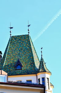 Low angle view of traditional building against blue sky