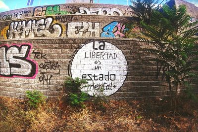 Information sign against blue sky