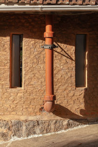 Low angle view of window of old building