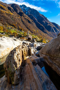 Scenic view of mountain against cloudy sky