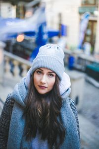 Portrait of beautiful young woman in park