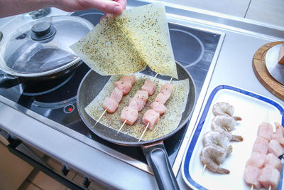 High angle view of man preparing food