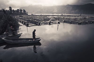 View of boats in calm lake