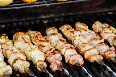 Close-up of meat on barbecue grill