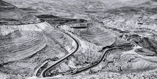 High angle view of road passing through land