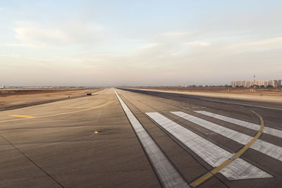 View of airport runway against sky