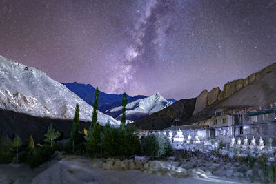 Scenic view of mountains against sky during winter