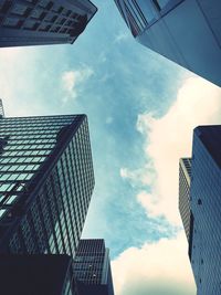 Low angle view of skyscrapers against sky