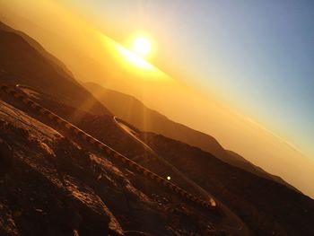 Scenic view of mountains against sky during sunset