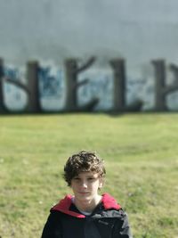 Portrait of boy on field